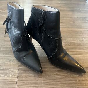 (Dior) Pointed toe booties w/ charm accent in black leather